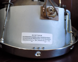Bosch H1 adjustment instruction label on headlight assembly.