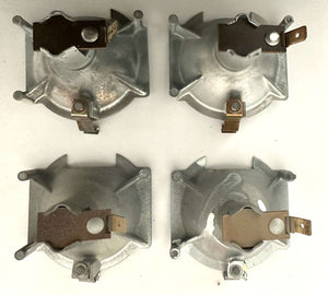 LWB U.S. tail light housing with city light reflector, set of four components.