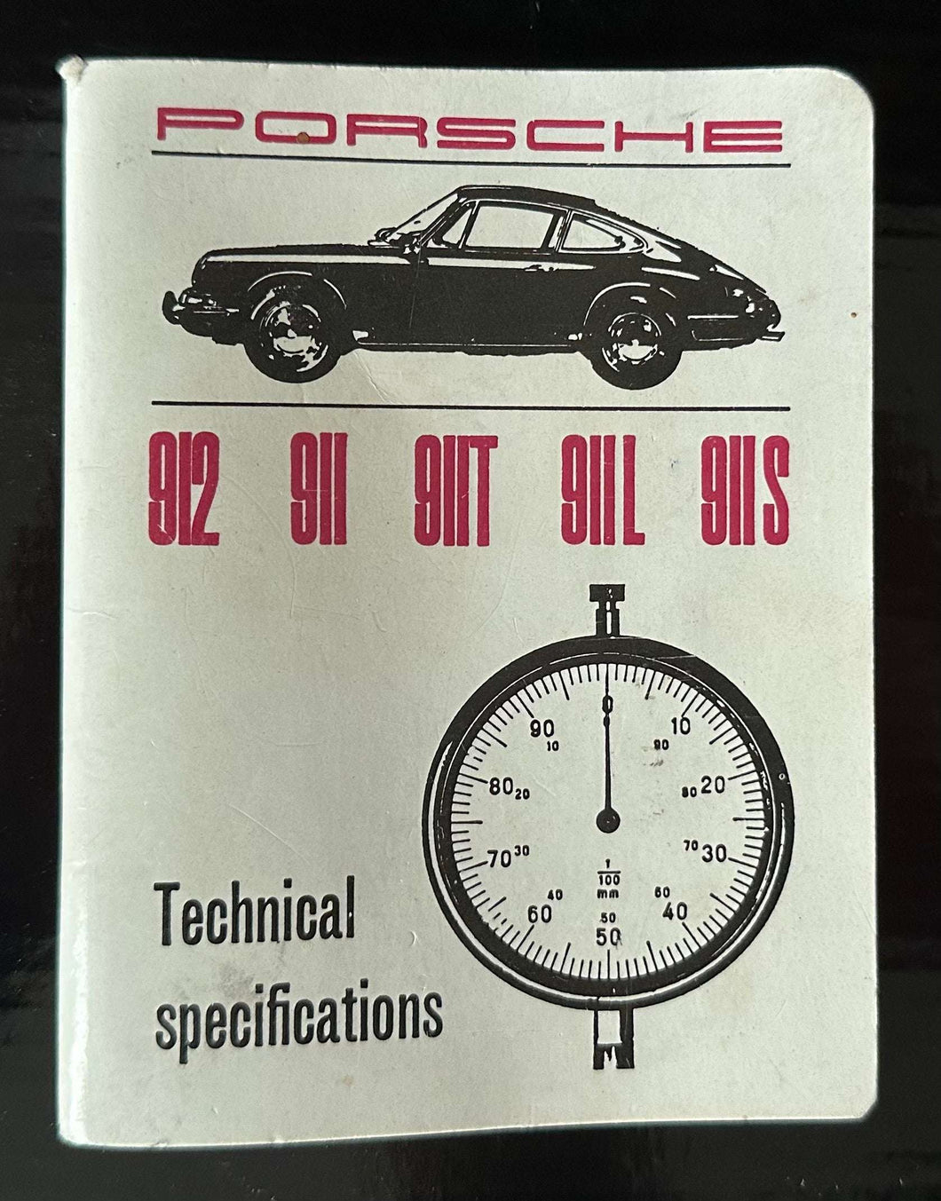 Porsche Technical Specifications Booklet 1967 with vintage car illustration and speedometer.