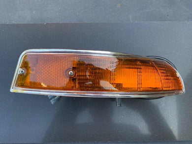 Porsche 911 LWB turn signal restoration service, featuring high-quality lenses and original housing.