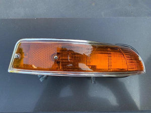 Porsche 911 LWB turn signal restoration service, featuring high-quality lenses and original housing.