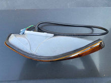 Load image into Gallery viewer, Restored Porsche 911 LWB turn signal with premium lens and stainless steel screws.