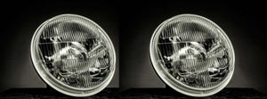 Koito H4 Headlight Upgrade Kit pair with clear lenses for enhanced road illumination.