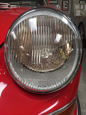AC Platinum™ LED Series headlight close-up, featuring advanced Philips Integrated Beam LED technology for Porsche.