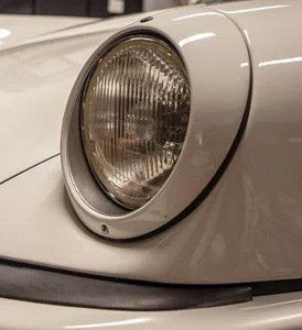 Sugar Scoop Headlights on classic car with modern Hella H4 halogen insert.
