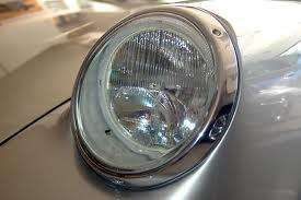 SEV Marchal Amplilux Headlights on vintage car, chrome trim, clear lens