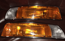 Load image into Gallery viewer, Restored Porsche 911 SWB turn signals and tail lights with high-quality lenses and chrome plating.