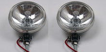 Load image into Gallery viewer, Hella 118 TTG Euro driving lights with five rivets, offering superior visibility.