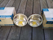 Load image into Gallery viewer, SEV Marchal Amplilux Headlights set with original boxes on wooden surface.