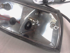 LWB turn signal U.S. to Euro conversion kit close-up displaying interior components and bulb placement.