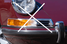 Load image into Gallery viewer, LWB Turn Signal Euro Conversion Kit installed on vintage car front.