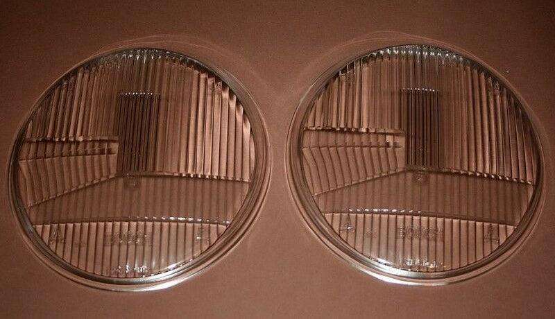 Bosch RHD H1 headlight lens pair with Bosch logo.