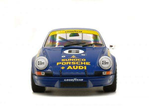Cibié Bi-Iode headlights on vintage blue Porsche 911, front view, showcasing restoration service reliability.